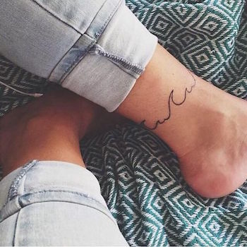 girly tattoos on leg